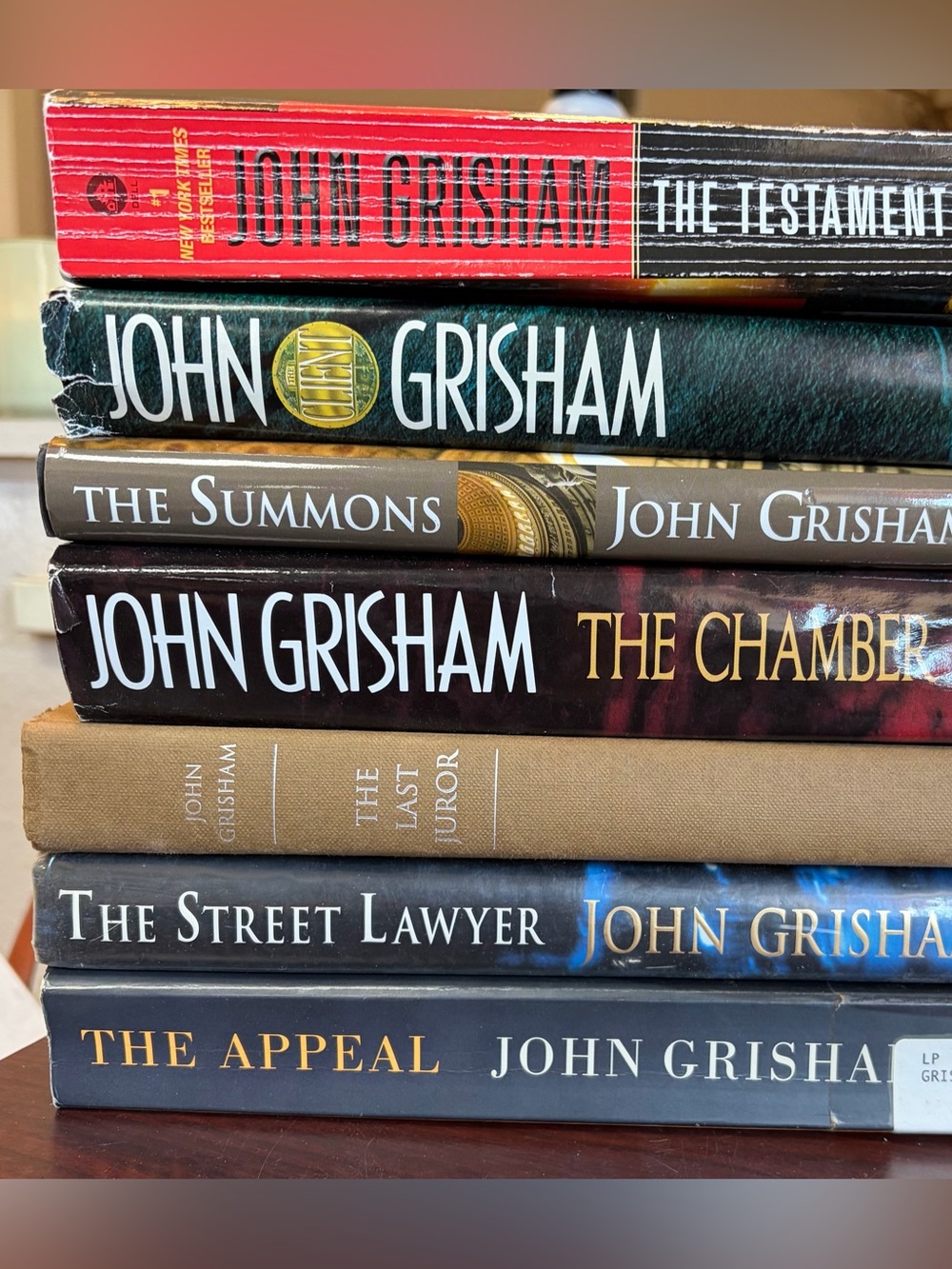 Stack of John Grisham Hardcover & Paperback Books - Legal courtroom drama